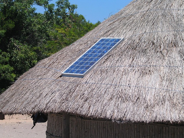 Large dairy farm barn with solar panels covering the entire south-facing roof in Somerset countryside
